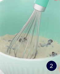 Whisk hot heavy cream and chocolate chips